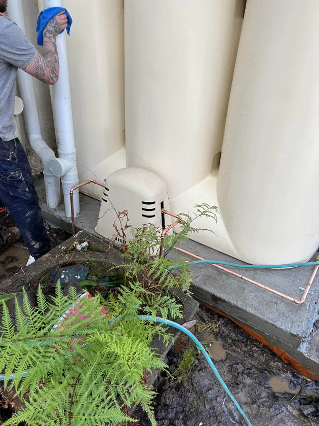 Tank overflow plumbed to the garden drainage point